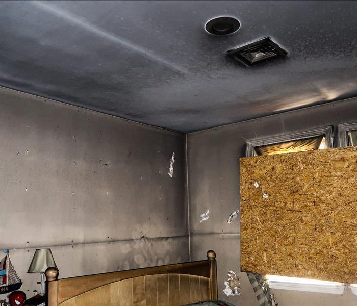 Soot damage in a room after a fire. 